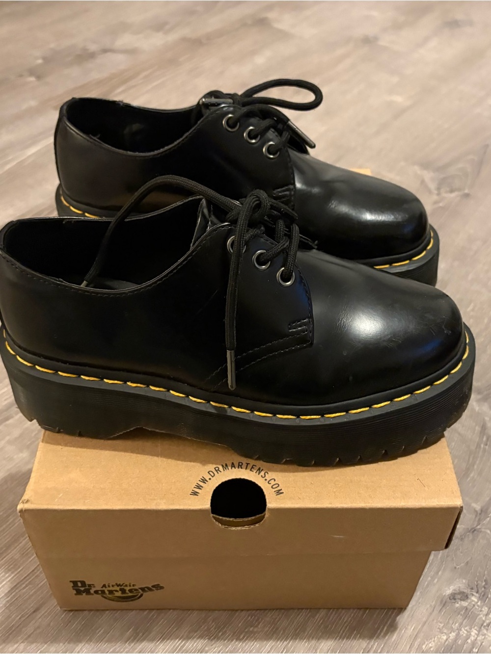 Dr. Martens Black Leather Platform Lace-Up Boots with Yellow Welt